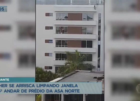 mulher-limpa-janela-no-quinto-andar,-pelo-lado-de-fora,-na-asa-norte-(df)