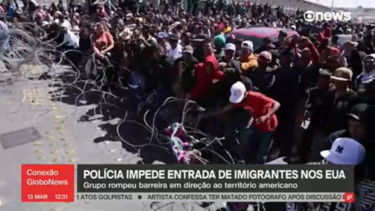 VÍDEO: Centenas de migrantes no México tentam entrar à força nos EUA